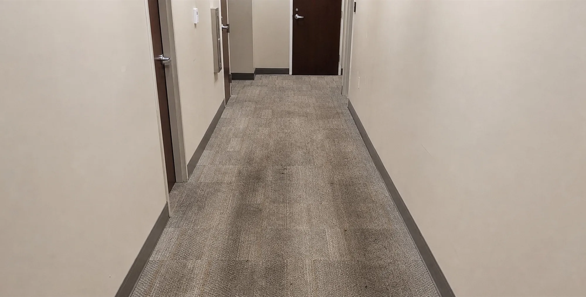 Before: Commercial hallway carpet