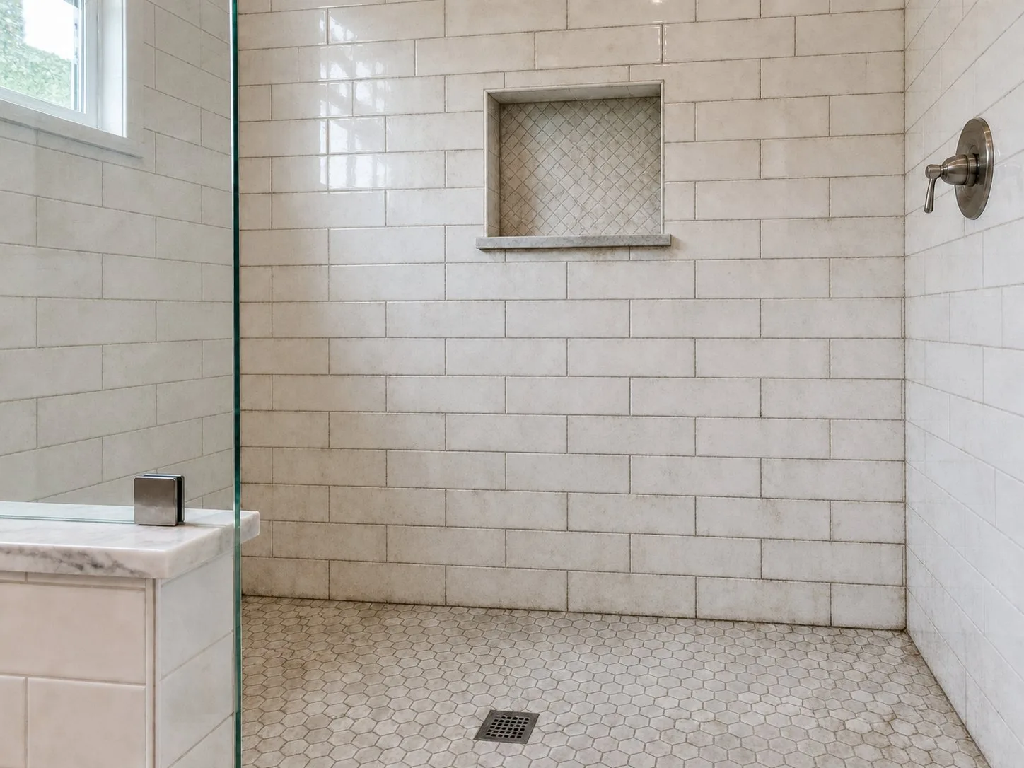 Before tile and grout cleaning showing discolored grout in shower